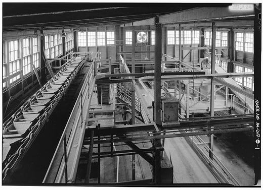 INTERIOR VIEW OF MOLDING ROOM, NO. 2 WORKS, SHOWING BUCKET LINE FEEDING MOLDING MACHINES - Harbison-Walker Refractories Company, Molding Room