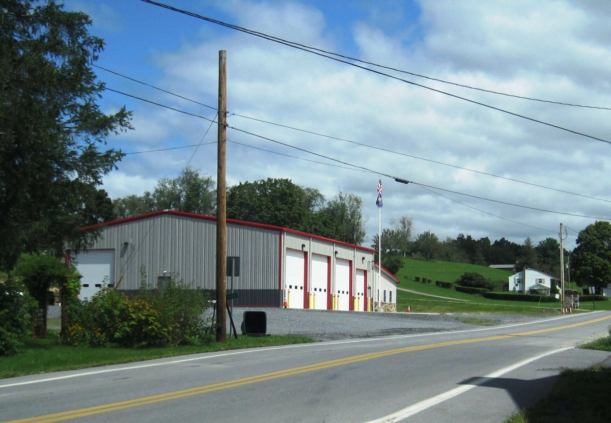the Shavers Creek Fire Company in the village of Mooresville within West Township, Huntingdon County, Pennsylvania. Photo taken from the intersection of Pennsylvania Route 305 (Greenwood Road) / Charter Oak Road looking